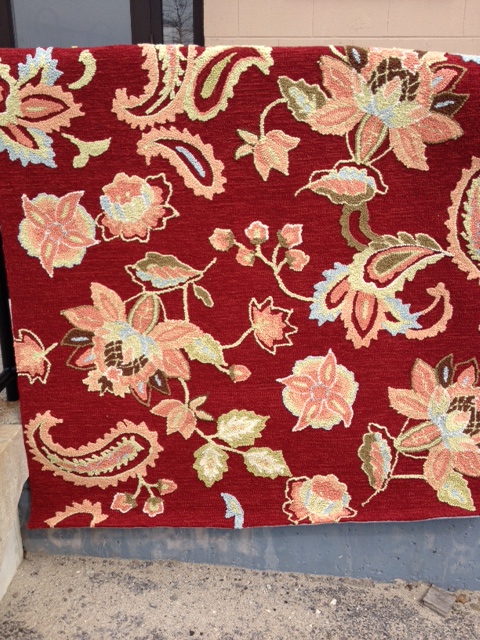 Photo of red paisley area rug