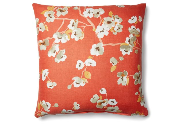 photo of orange floral pillow