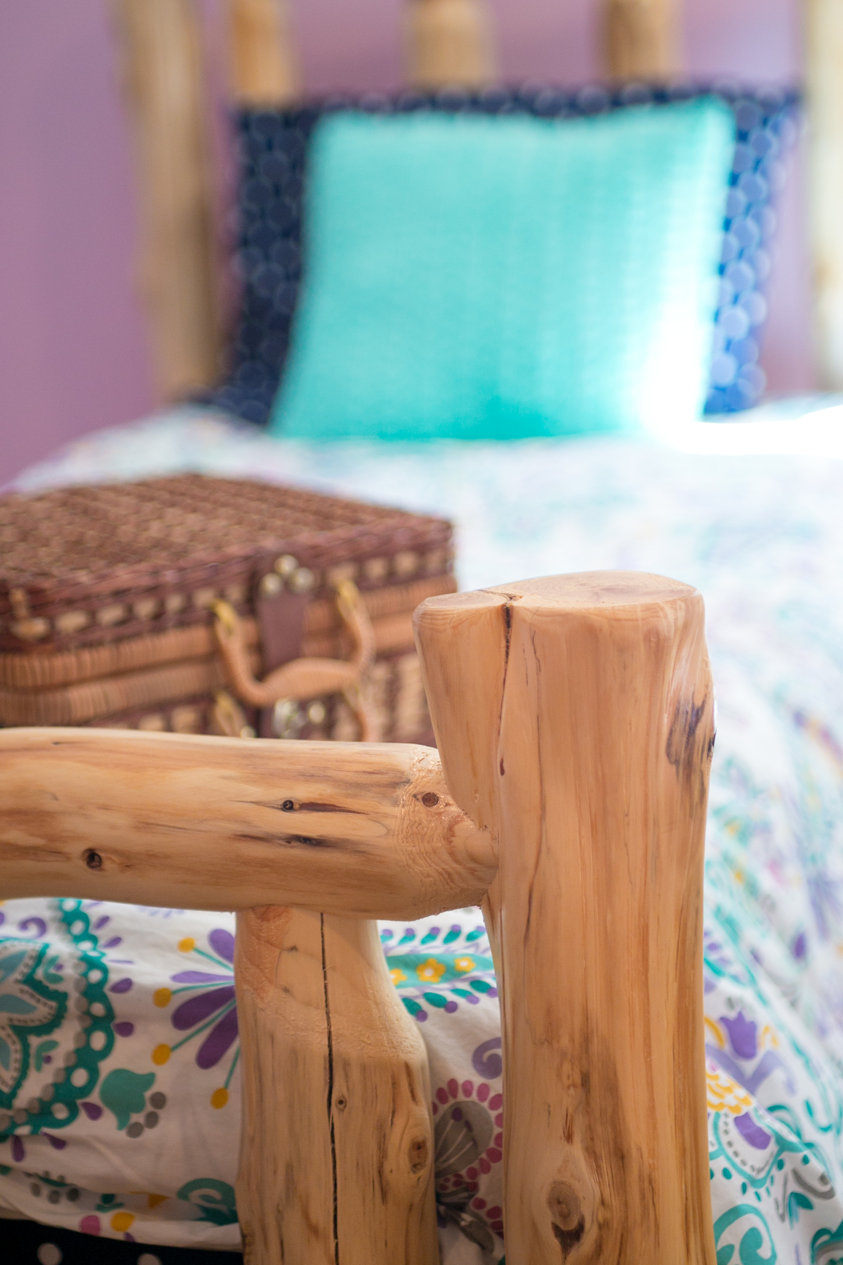 photo of pine log bed and bedding
