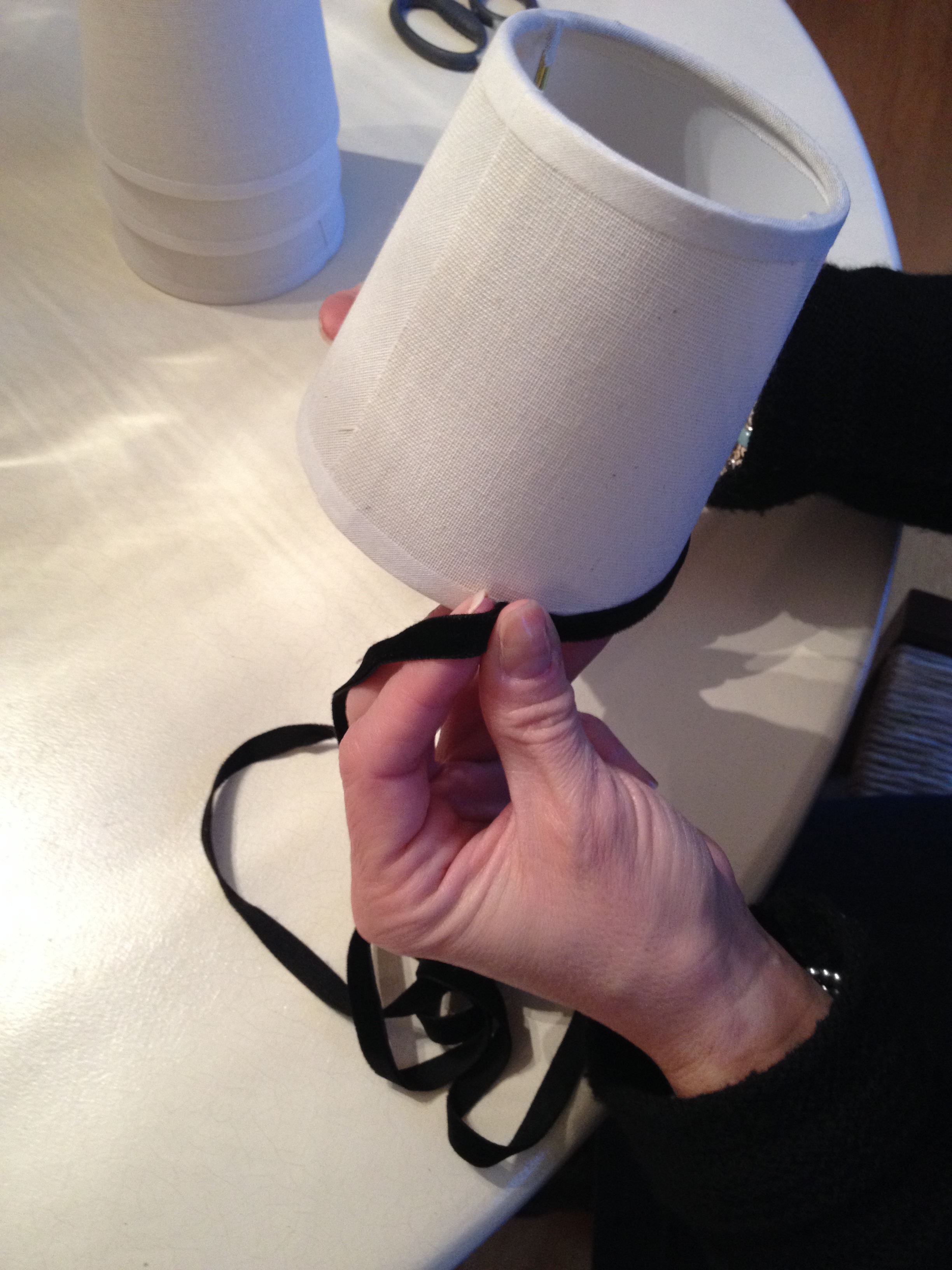 photo of measuring trim for shade